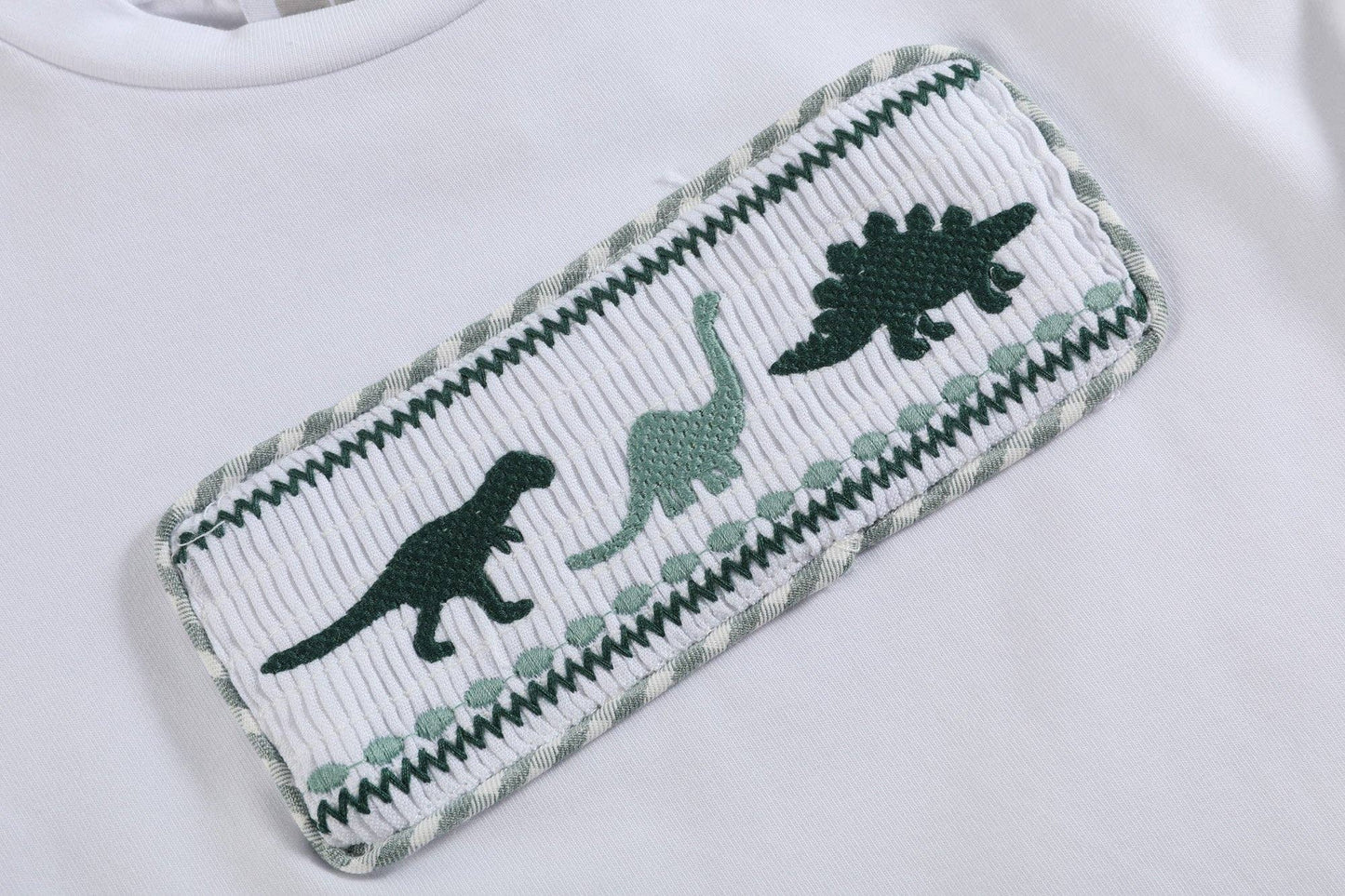 White Dinosaur Smocked Tee and Green Gingham Shorts Set