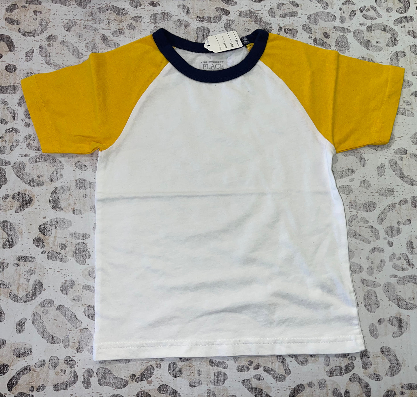 CP white  t shirt with navy collar and yellow sleeves